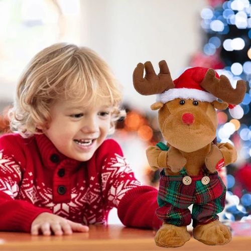 dijete u crvenom puloveru uz bozicnog soba koji svira i plese