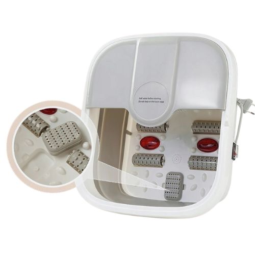 Detaljan uvid u dno masažera s pokretnim akupresurnim valjcima i čvorićima za masažu refleksnih zona.